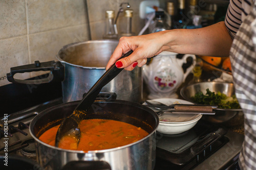 woman hand cooking preparing mexican food homemade in mexico city