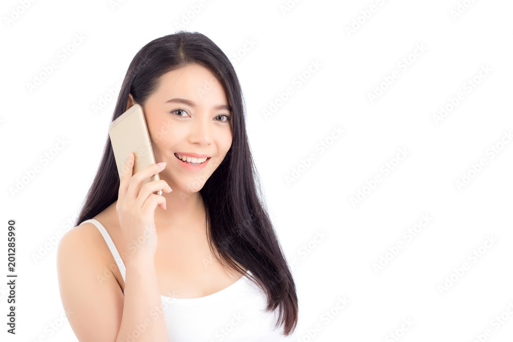 Beautiful of portrait asian young woman smile and happy talking calling with mobile phone isolated on white background. Beautiful of portrait asian young woman smile and happy talking calling with mobile phone isolated on white background.