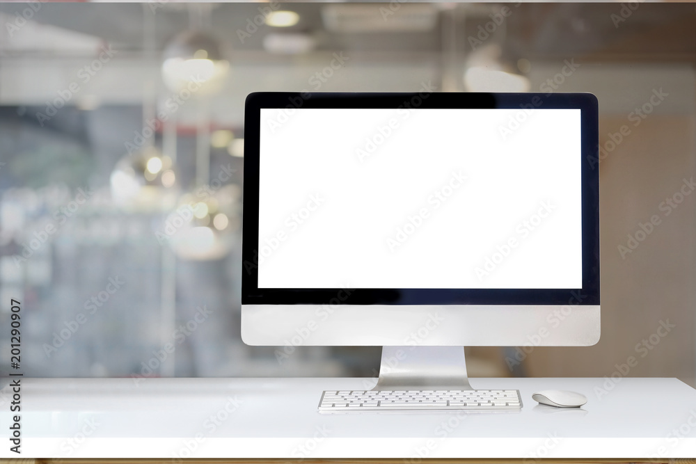 Mock up desktop computer on office table. Blank screen for graphic display montage Mock up desktop computer on office table. Blank screen for graphic display montage