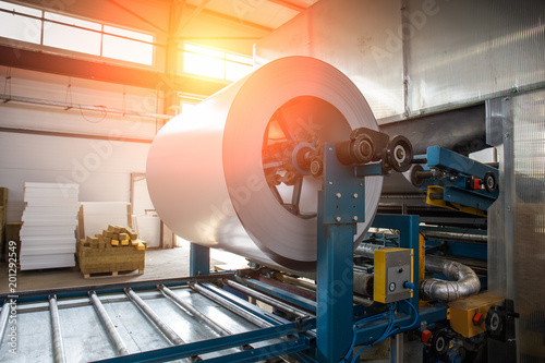 Fotografie Industrial galvanized steel roll coil for metal sheet forming machine in metalwo