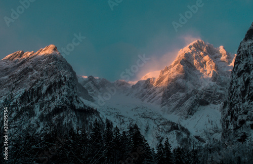 winter alpine mountain landscape during sunset, kamnik alps, slovenia.