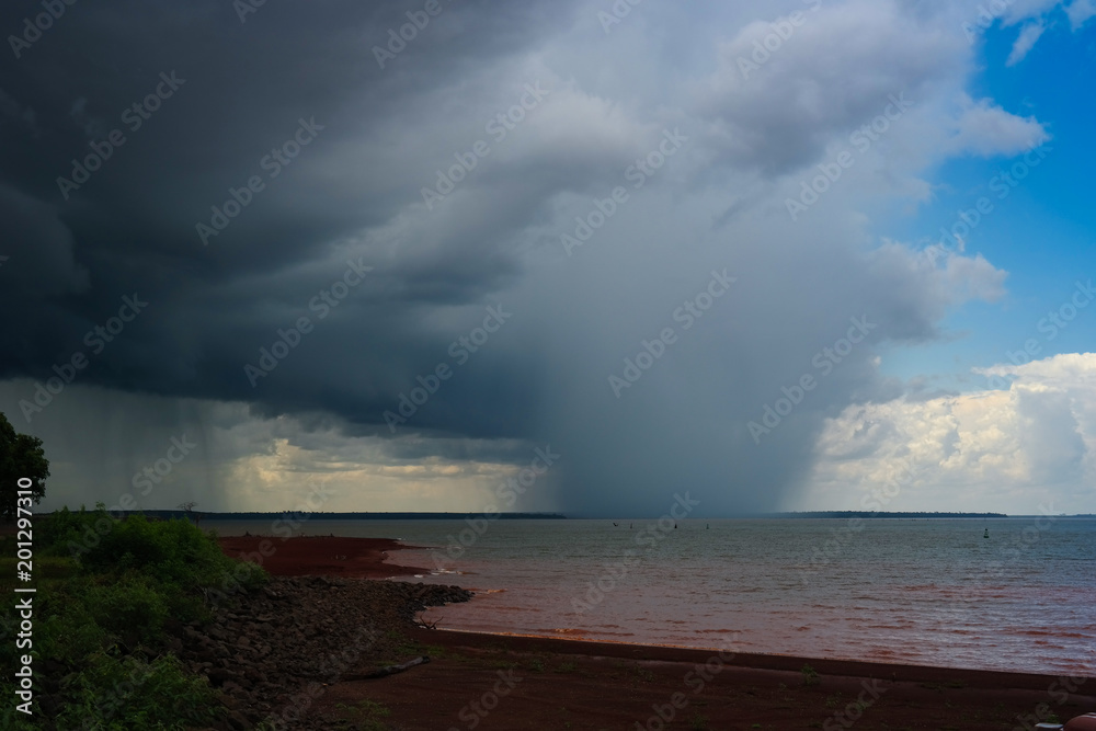 Lake, rain clouds and dramatic sky - Here comes the rain