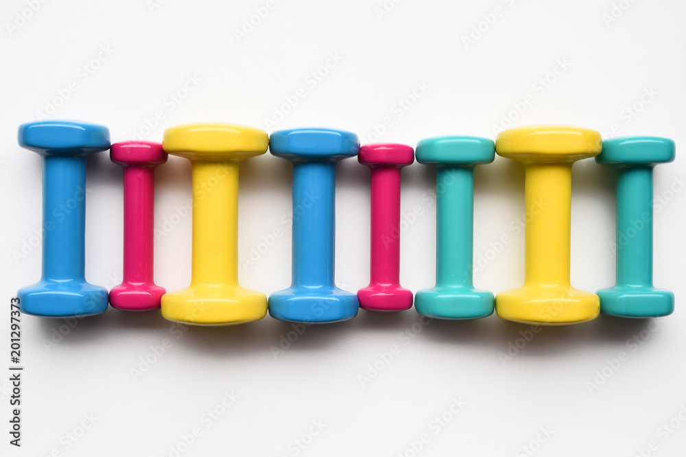 close up of dumbbell isolated on white background close up of dumbbell isolated on white background