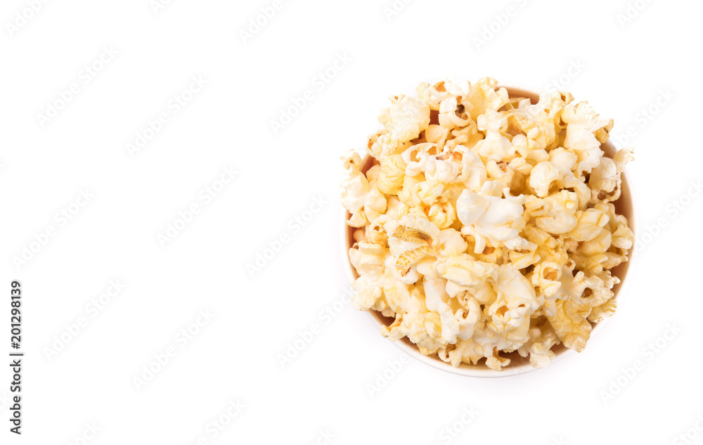 Popcorn in bowl isolated on white background.topview Popcorn in bowl isolated on white background.topview