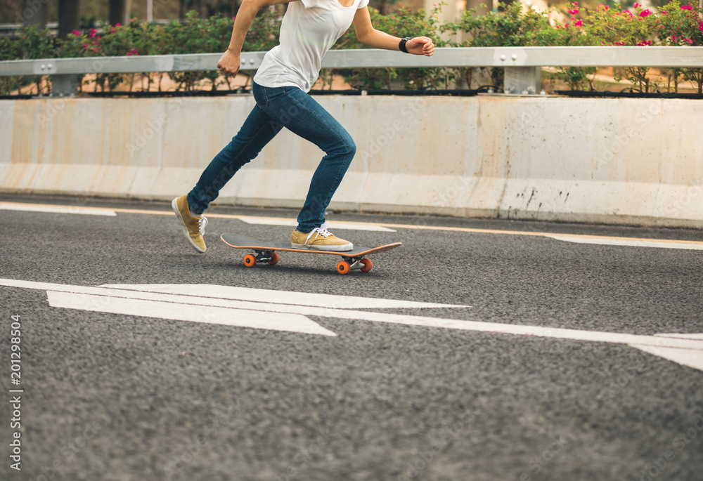 Skateboarder sakteboarding on highway Skateboarder sakteboarding on highway