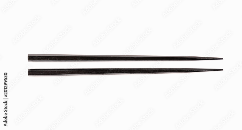 Black chopsticks isolated on white background. Black chopsticks isolated on white background.