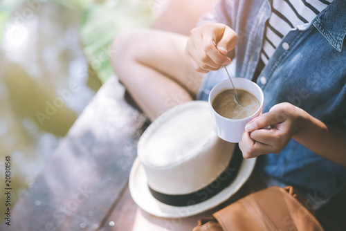 Coffee cup in woman hand.