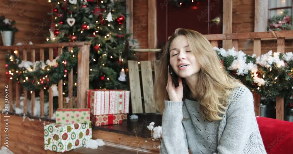 Young woman celebrates Christmas. Young woman celebrates Christmas.