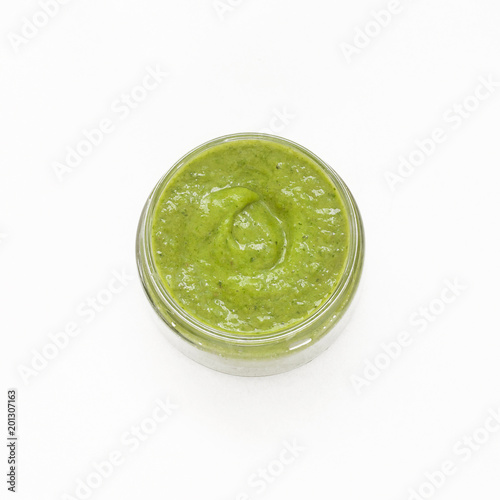 Green smothie isolated on white background. Flat lay, top view