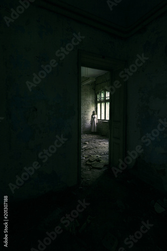 Horror ghost girl in abandoned building