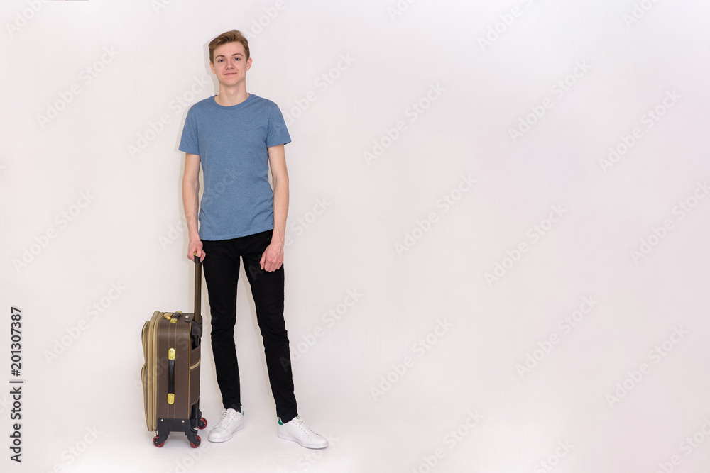 young man with travel suitcases on a white background in different poses young man with travel suitcases on a white background in different poses