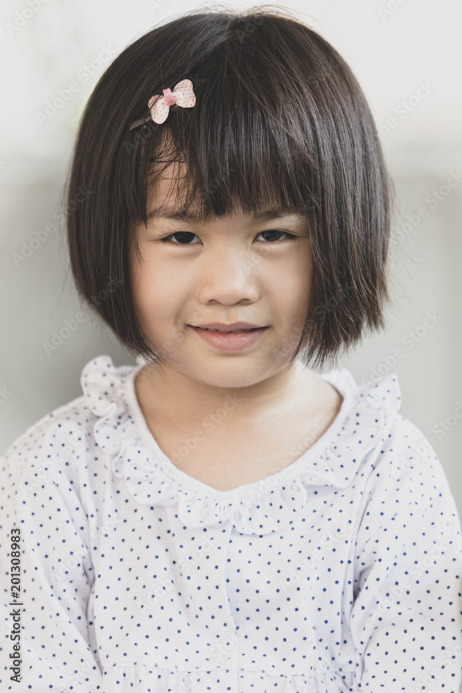 close up toothy smiling face of lovely asian children wearing sleeping suit close up toothy smiling face of lovely asian children wearing sleeping suit