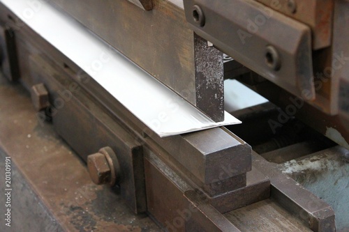working bending metal sheet by high precision metal sheet bending machine.