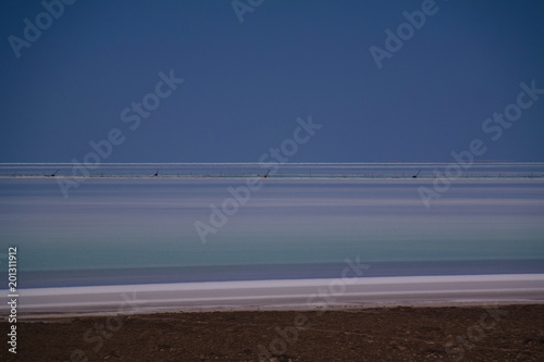 Panorama view to saline Barsa Kelmes lake and Ustyurt plateau at Karakalpakstan, Uzbekistan photo