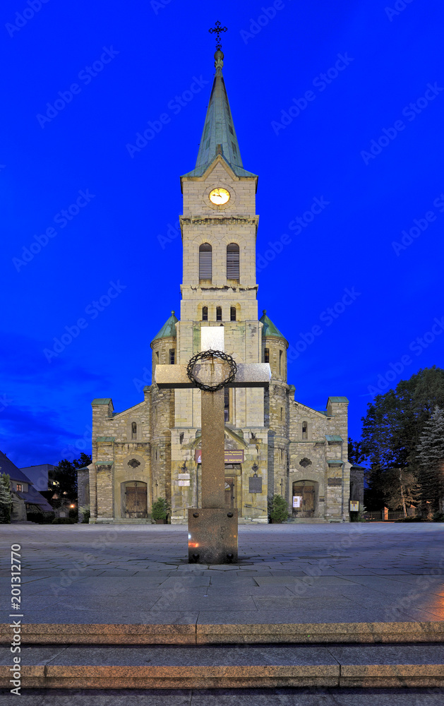 Obraz premium Zakopane, Poland - Traditional Holy Family Parish Church at the Kupowki street, main pedestrian boulevard of Zakopane
