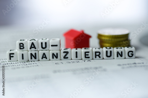 German Word Construction Financing formed by alphabet blocks: BAUFINANZIERUNG