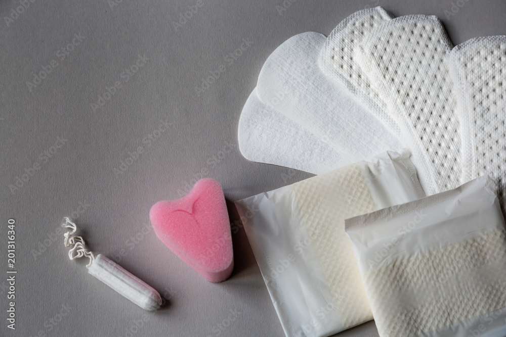 Soft tampons. Menstrual cycles. Revolutionary novelty in the field of  hygiene. Hygiene and protection Stock Photo | Adobe Stock