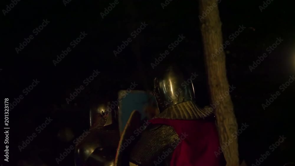 Knights fighting in a sword tournament during a middle ages reenacting on July 28 2017, Arezzo (Italy) Knights fighting in a sword tournament during a middle ages reenacting on July 28 2017, Arezzo (Italy)