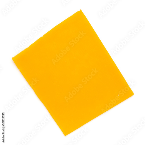 Cheddar cheese slice isolated on the white background.