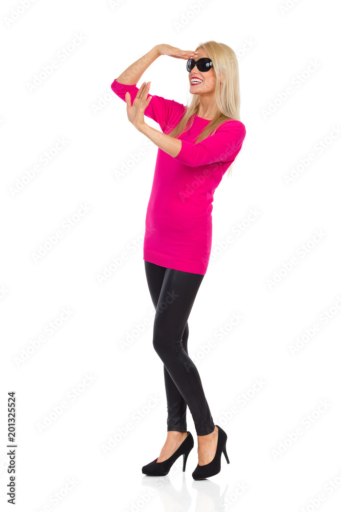 Fototapeta premium Happy Beautiful Woman Is Looking Away And Waving Hand