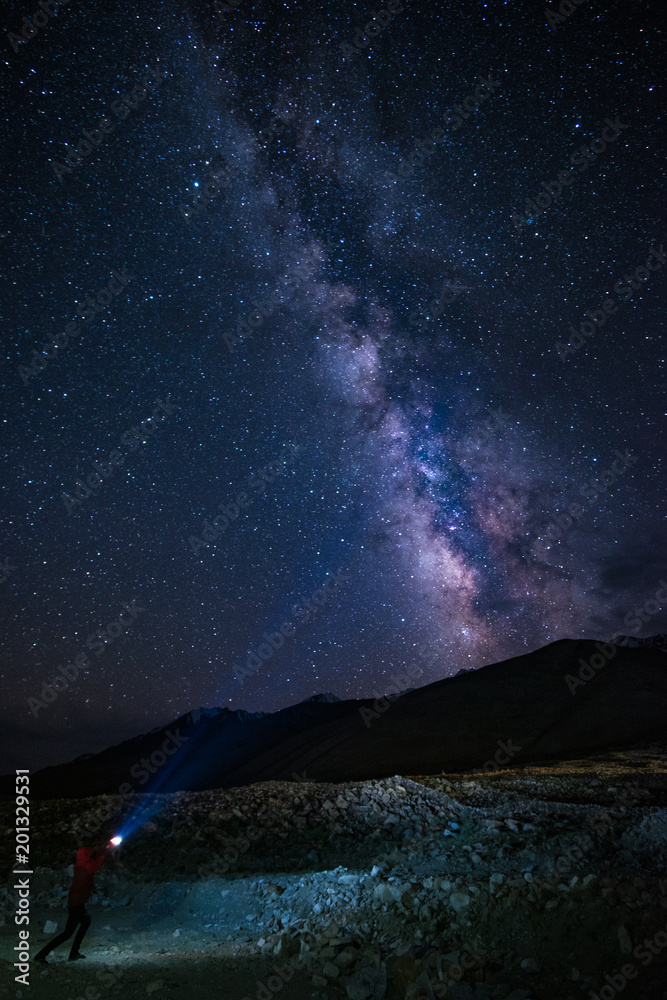 Milky Way rises over the mountain near Pangong Lake in Ladakh, Jammu and Kashmir State, India Milky Way rises over the mountain near Pangong Lake in Ladakh, Jammu and Kashmir State, India