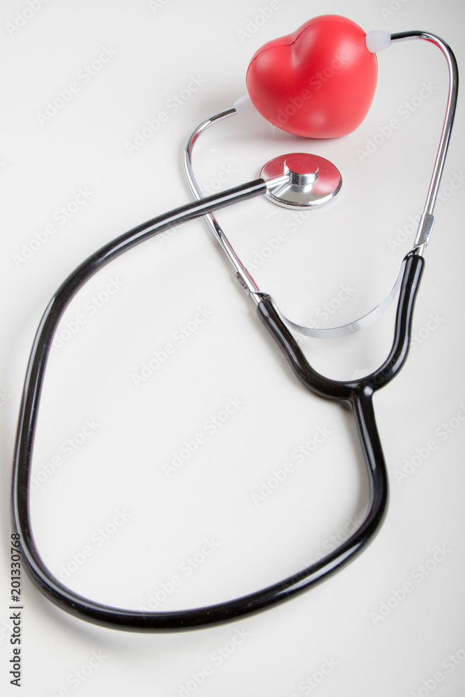 Health concept with a heart and a stethoscope Health concept with a heart and a stethoscope