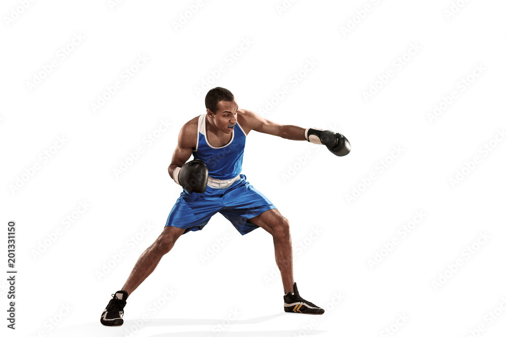 Sporty man during boxing exercise making hit. Photo of boxer on white background Sporty man during boxing exercise making hit. Photo of boxer on white background