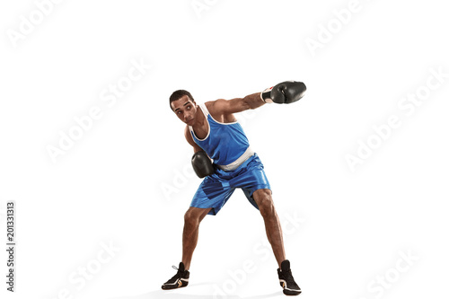 Sporty man during boxing exercise making hit. Photo of boxer on white background