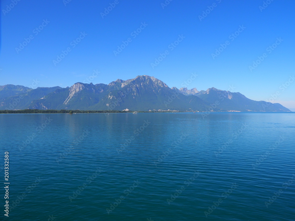 Panoramic view of alpine Lake Geneva landscape seen from Chateau de Chillon in Montreux city in SWITZERLAND