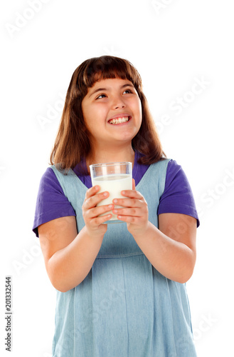 Adorable child drinking milk