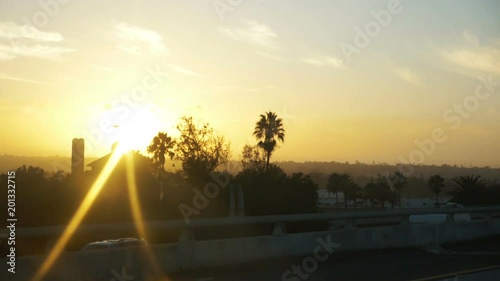 Professional video of POV driving a car at sunset in California in slow motion 180fps