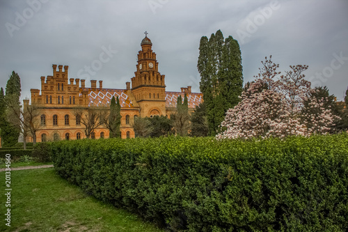 Obraz na plátně old university campus yard with garden