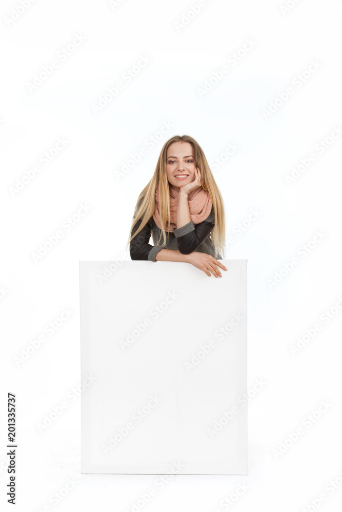 blonde girl on a white background with an empty billboard blonde girl on a white background with an empty billboard
