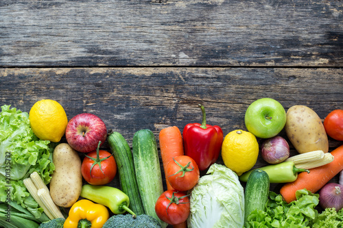 Fototapeta Naklejka Na Ścianę i Meble -  Top view of fruits and vegetables on the old wood table With copy space