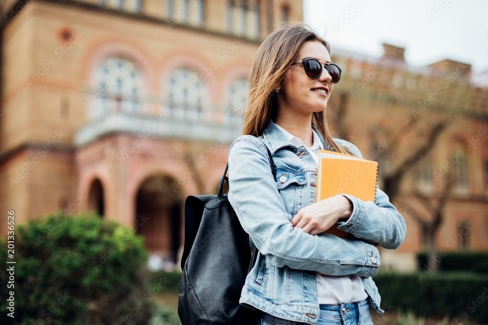 Obraz premium A portrait of a mixed race college student at campus