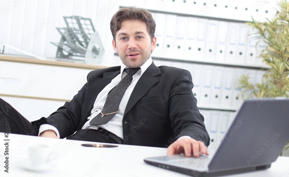 closeup of a senior Manager sitting at Desk closeup of a senior Manager sitting at Desk