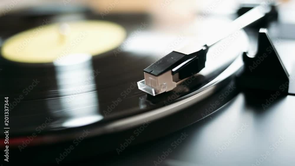 Gramophone needle playing record Gramophone needle playing record