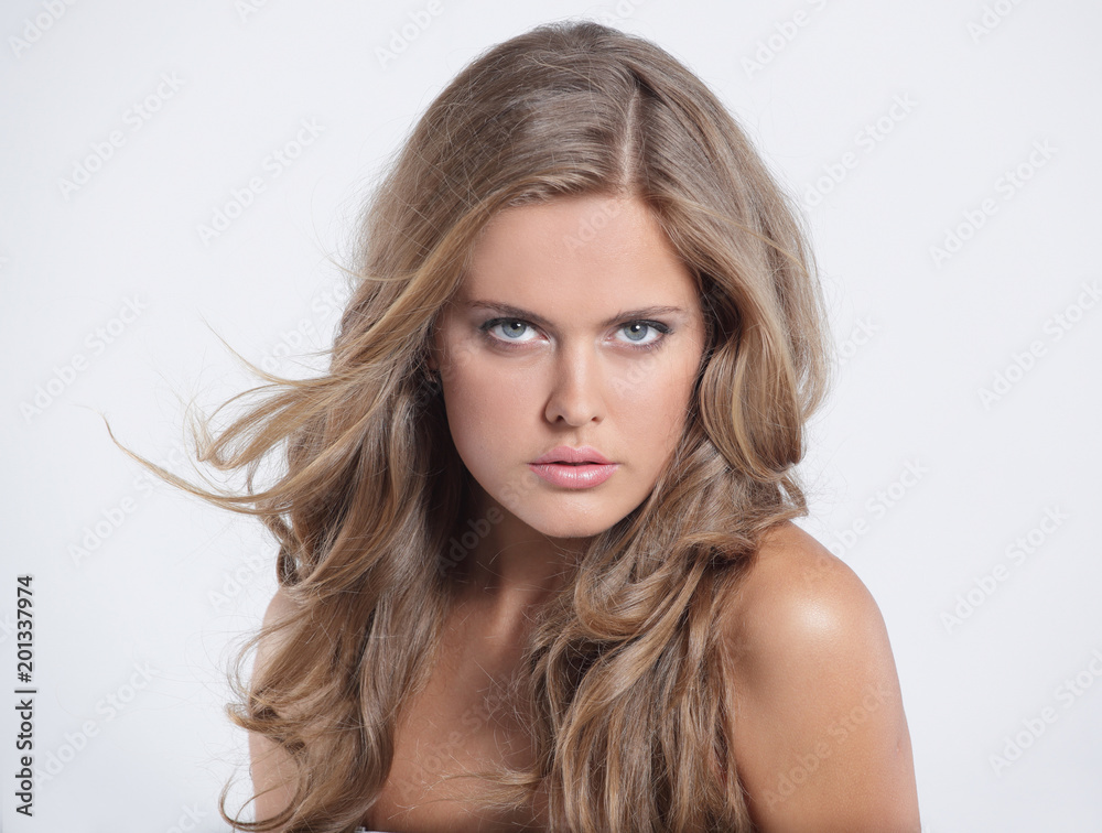 attractive woman portrait on grey background brunette looking at attractive woman portrait on grey background brunette looking at