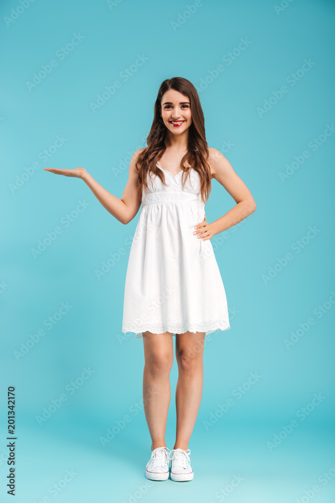 Full length portrait of a young girl in summer dress Full length portrait of a young girl in summer dress
