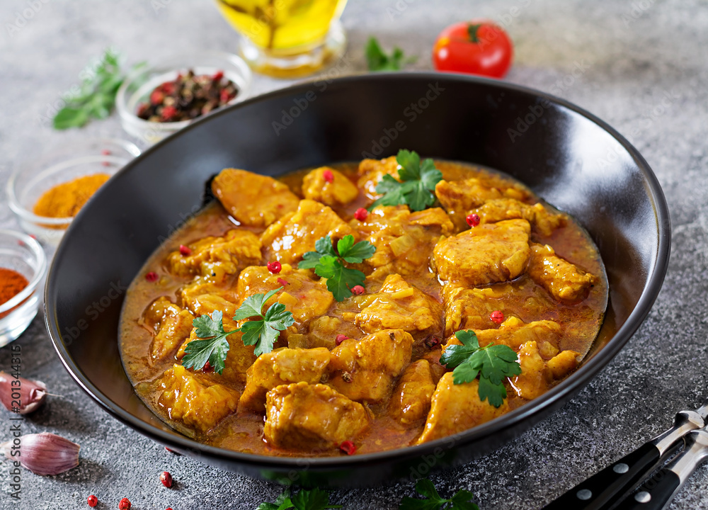 Curry with chicken and onions. Indian food. Asian cuisine. Curry with chicken and onions. Indian food. Asian cuisine.