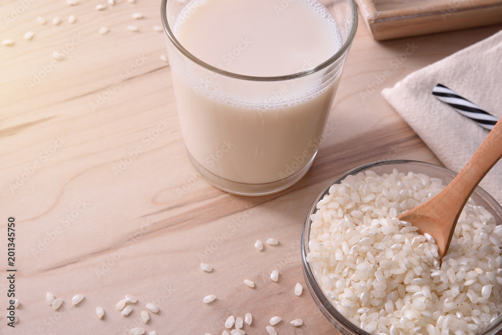 Rice drink in a glass on a wood table elevated Rice drink in a glass on a wood table elevated
