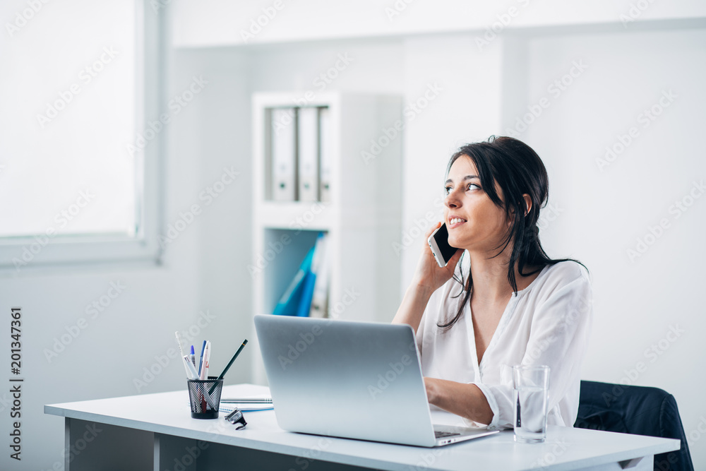 Young woman in office Young woman in office
