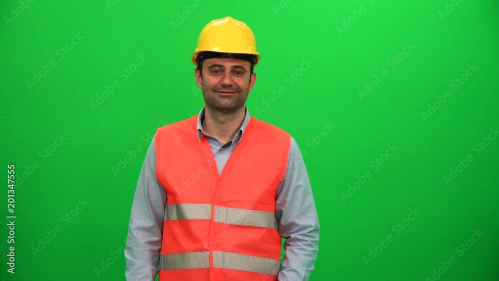 Engineer Man Touching Virtual Monitor on Green Screen Engineer Man Touching Virtual Monitor on Green Screen