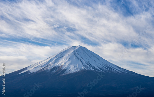 closeup mountain fuji on cloudscape blue sky
