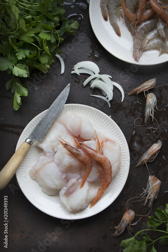 Raw fish and shrimps photo