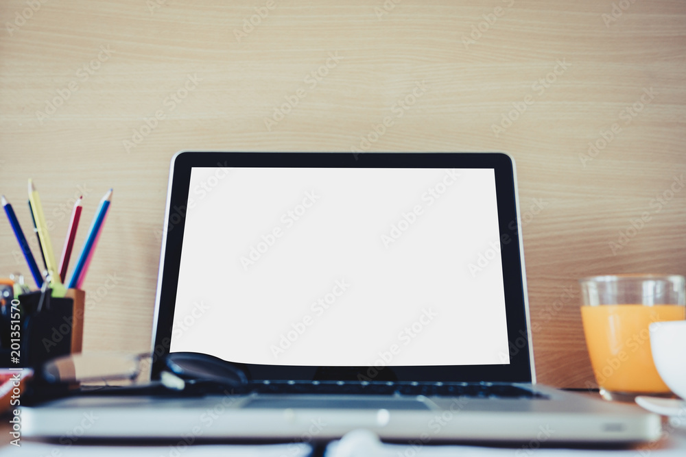 Office Business table desk Workspace with laptop, notebook against white wood wall background. Template mock up copy space for text. Freelancer's working place area. Working at home or online concept Office Business table desk Workspace with laptop, notebook against white wood wall background. Template mock up copy space for text. Freelancer's working place area. Working at home or online concept