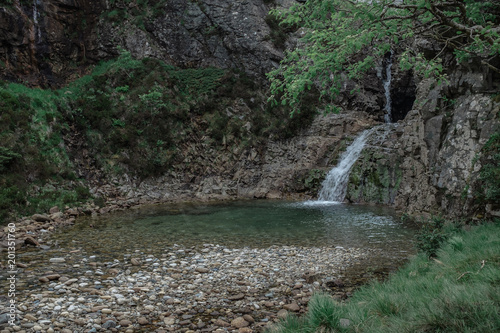A waterfall in a mountains.