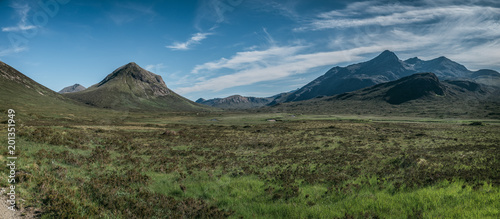Beautiful panorama of a valley and surrounding mountains of Cuillin.