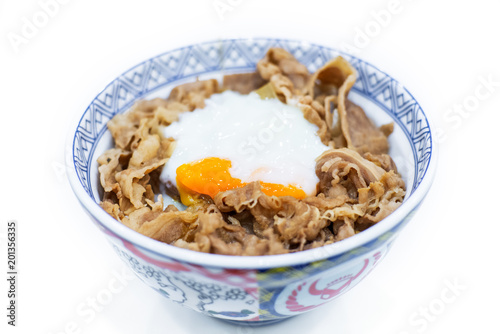 Japanese Food, bowl Gyudon beef on rice with Egg yolk topping isolated on white background
