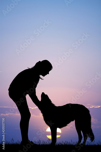 illustration of girl with dog at sunset